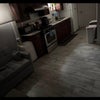 Photo 2: Kitchen area