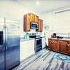 Photo 2: Stocked Kitchen