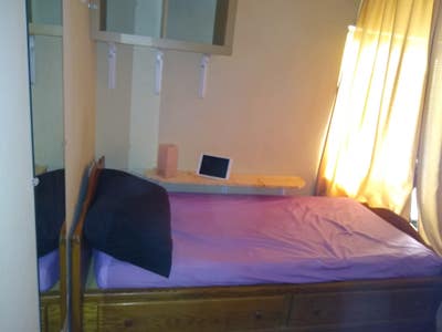 Twin-siize bed in the living room:  Main Photo