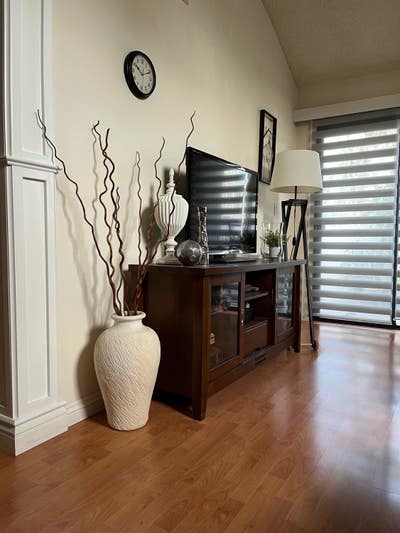 A Nicely Decorated Bedroom with Tennis ct. Access Main Photo