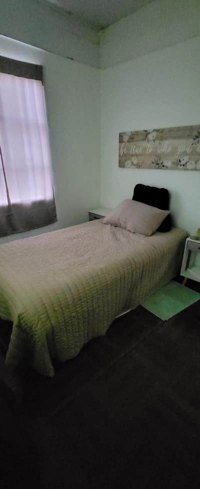 Cute small room with a twin size bed.  Main Photo