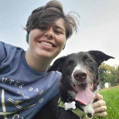 Hybrid worker with friendly dog Main Photo