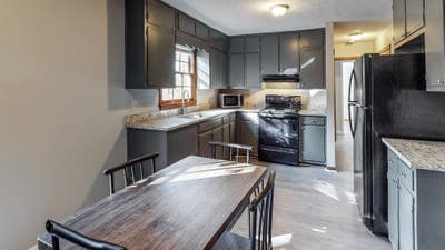  Modern Stonecrest Home with Luxury Touches Near A Main Photo