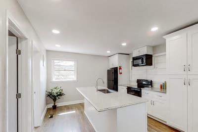 ** Beautifully Renovated Brick Home. Close to Tran Main Photo