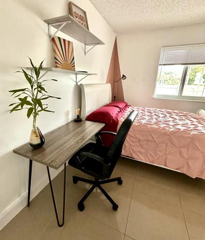 Modern room w/ mini fridge & microwave inside Main Photo