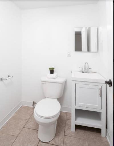 Spacious bedroom furnished with a full-size bed! Main Photo