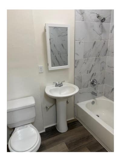 Renovated large 1 bed corner south west facing lot Main Photo