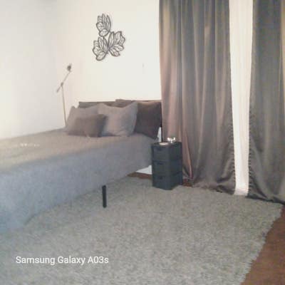 A Quiet LG Bedroom.   Main Photo