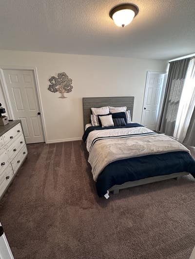 Furnished Master Bedroom with Private Bathroom Main Photo