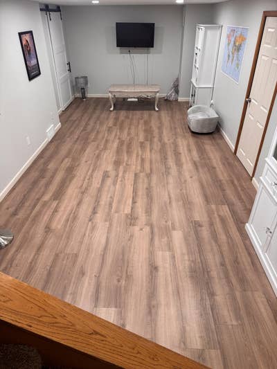 Bottom floor of home w/ bed, bath, living rms, W&D Main Photo