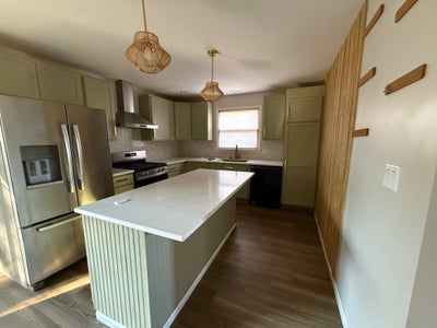 You get 2 bedrooms, living room, utilities include Main Photo