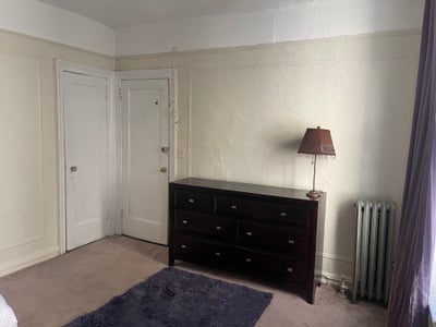 Lg. furnished br. w/util. incl.-train 1 block away Main Photo