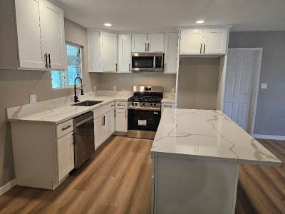 3 bed 2 full bath plus sunroom. Main Photo