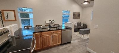 Charming 1 bed bath fully furnished new above gara Main Photo