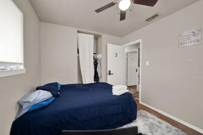 Bedroom_ Private Room with Shared Bathroom Main Photo