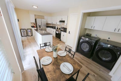 Enjoy suburban tranquility while remaining minutes Main Photo