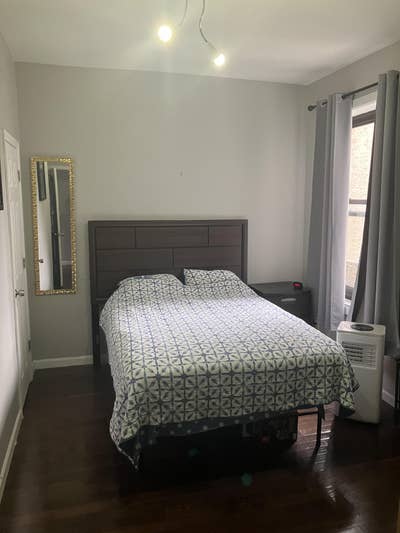 Spacious, furnished bedroom in central Harlem Main Photo
