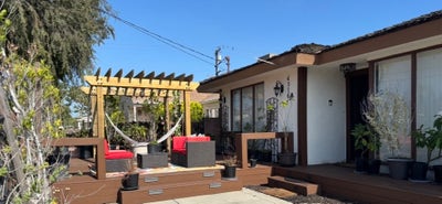 Furnished quiet bedroom. View of front patio Main Photo