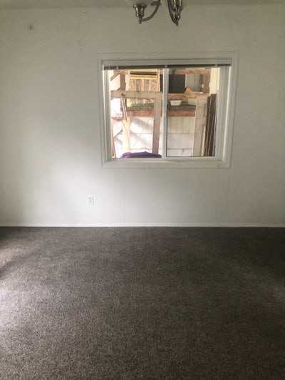14.7 ft x 11 ft  room in an older updated house.  Main Photo