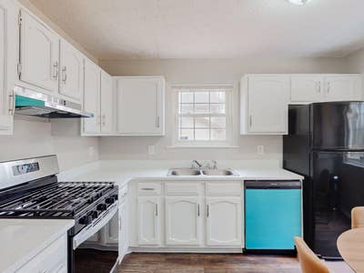  Renovated Stone Mountain Home | Backyard • Dining Main Photo