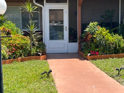 Room with patio and water views. Main Photo
