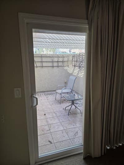 Large spare bedroom with private patio Main Photo