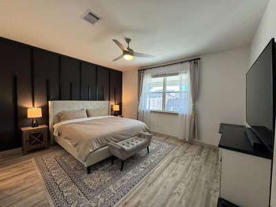 Upscale and completely remodeled home in gated com Main Photo