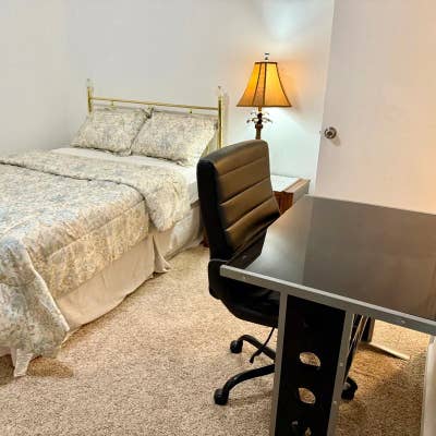 A serene and well_lit room designed to cater to th Main Photo