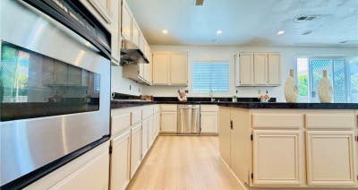 Charming Home with Fireplace and Lawn in Jurupa V Main Photo