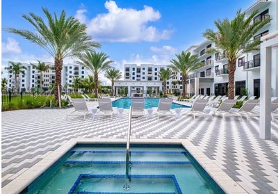 “Master Bedroom w/ Private Bath • Lake & Pool View Main Photo