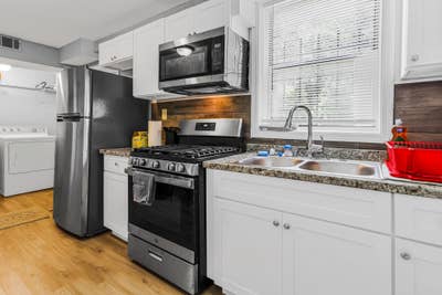 Fairburn Home, a 2 minute walk to transit stop Cam Main Photo