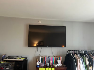 One large room with flat screen and Bathroom  Main Photo