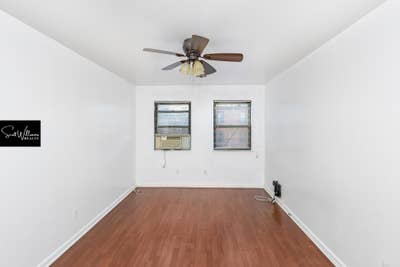 Large, Sunlit 3-Bedroom — All Utilities Included E Main Photo