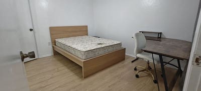 Bedroom with Private Bath in a Neutral Decor  Con Main Photo