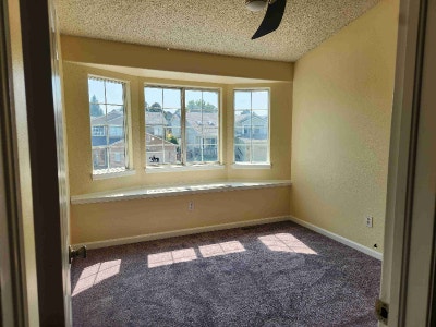 Bedroom with bay window and vaulted ceilings Main Photo