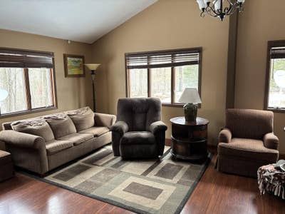 Beautiful home on 20 acres of wooded land Main Photo