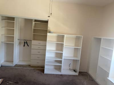 Large room with custom cupboards and closet  Main Photo