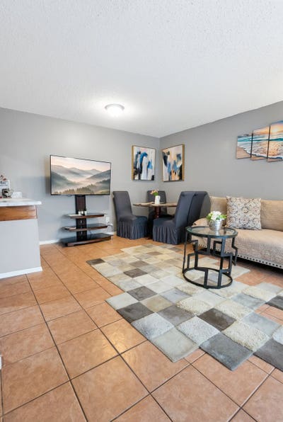 Cozy Furnished Condo | Walk to Hospital & Mall | A Main Photo