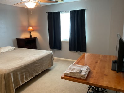 Large bedroom, full access to family room, kitchen Main Photo