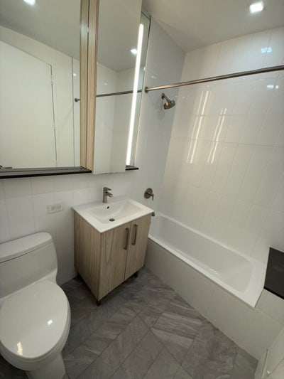 Last roommate needed in Luxury Midtown Building Main Photo