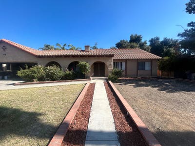Master Bedroom with bathroom & access to backyard Main Photo