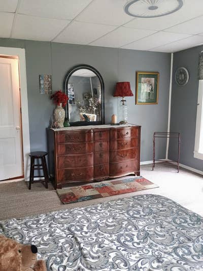 Master bedroom furnished in country home Main Photo