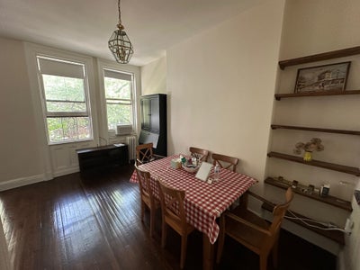 Treelined high ceiling apartment filled with light Main Photo