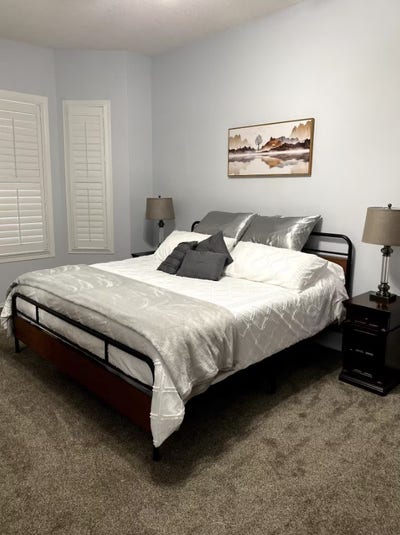 Furnished master bedroom with a personal bathroom Main Photo