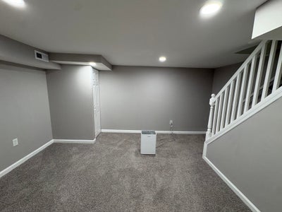 Lower Level Bedroom + Full Bath in Woodberry Main Photo