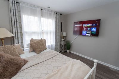 Bedroom with 2 Queen Beds in a Lux 3 Bedroom SFH  Main Photo