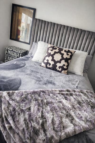 Private furnished guest bedroom and bath by Strip Main Photo