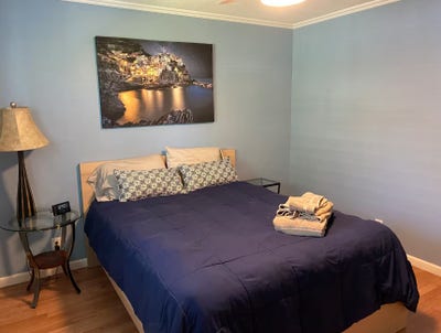 The living room offers comfortable seating, a larg Main Photo